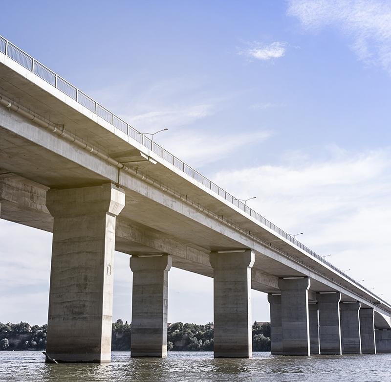 Photograph C: a long bridge deck carried by several concrete piers